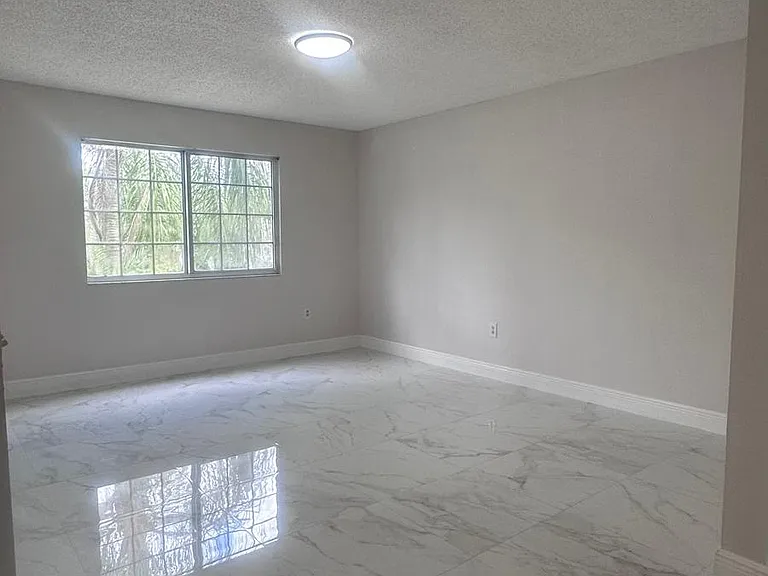 5011 Wiles Rd #207 — Photo 13