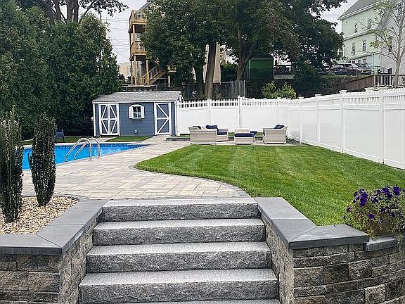 New landscaping and pool are