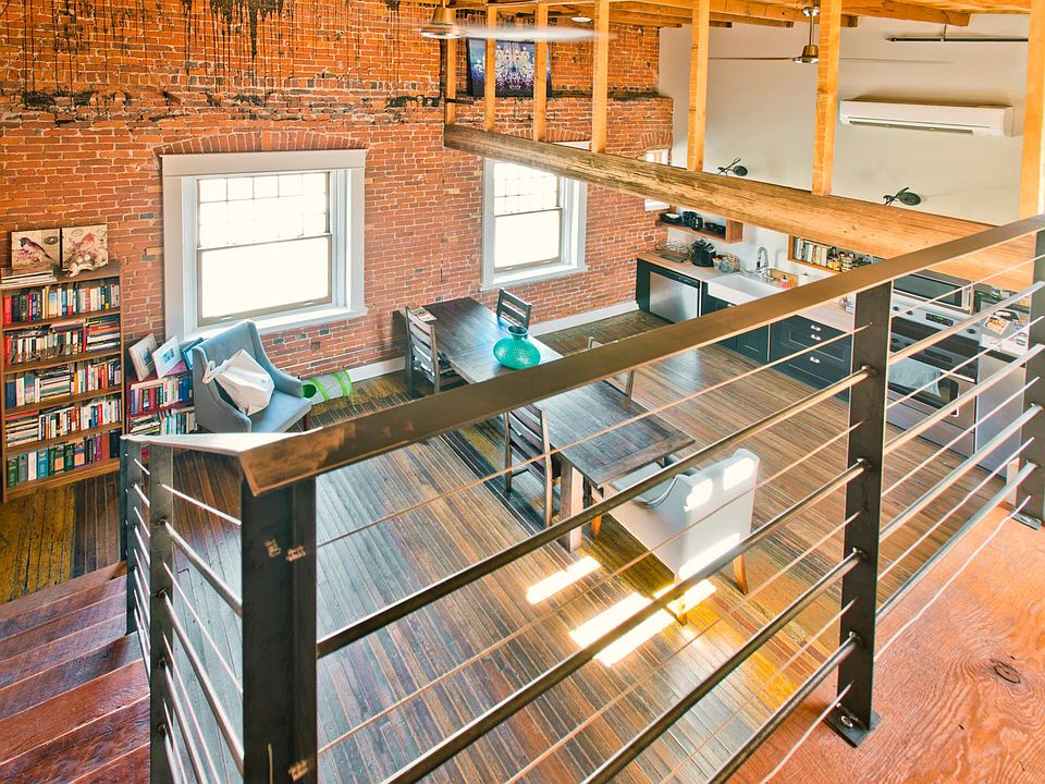 This apartment has 17ft ceilings and a second story loft.