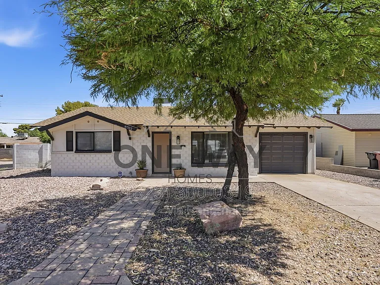 8702 E Sheridan St — Photo 1