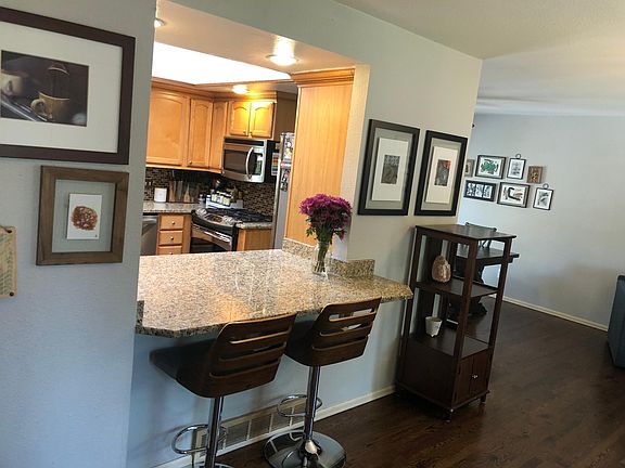 View across from entry, bar into kitchen area