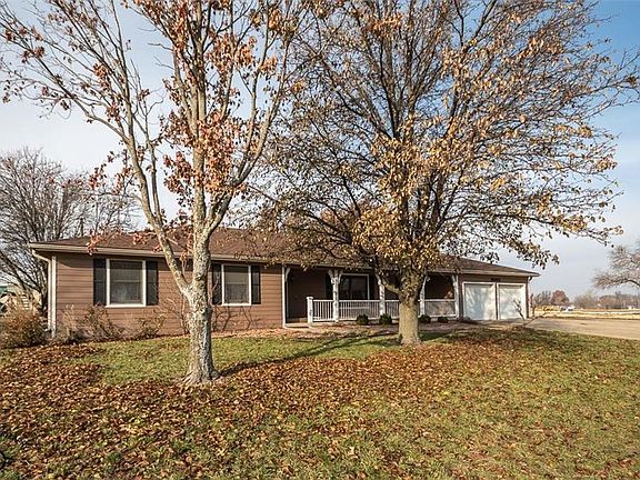 You can't see it but the garage apron is wide wide wide, like 4 stalls wide!