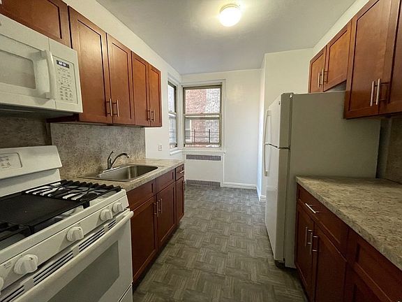 2nd image of 64-42 Booth St #1