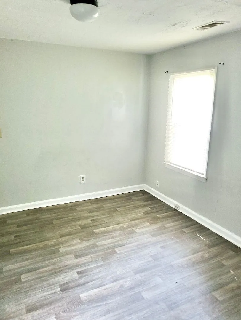 Freshly Updated Brick Ranch with Room to Relax — Photo 3