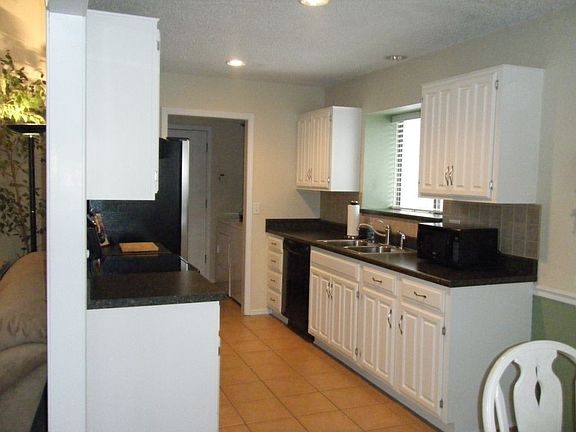 Updated kitchen with newer appliances.