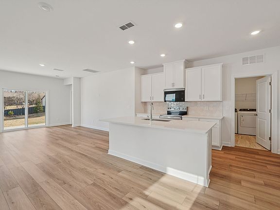 Dining area in the Vienna floorplan at a Meritage Homes community in Charlotte, NC.