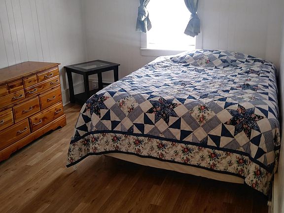 Bedroom with queen size bed and spacious closet