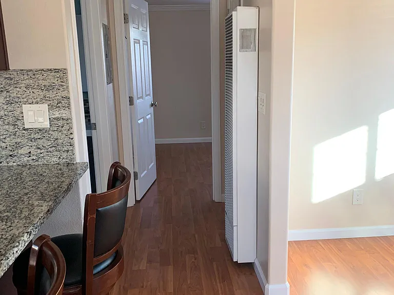 Hallway to the bedroom and bathroom
