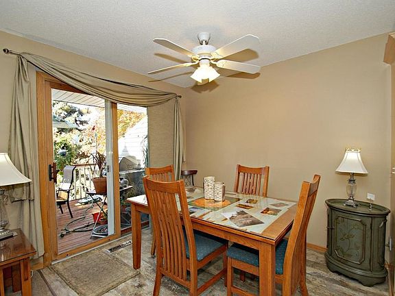 Bright dining area, adjacent to the patio. * Sellers  are adding a brand new maintenance free deck*
