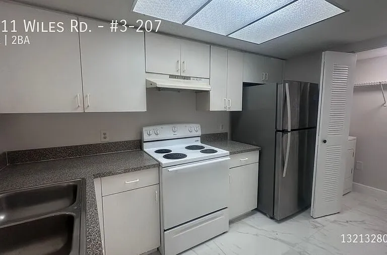 5011 Wiles Rd #3-207 — Photo 36