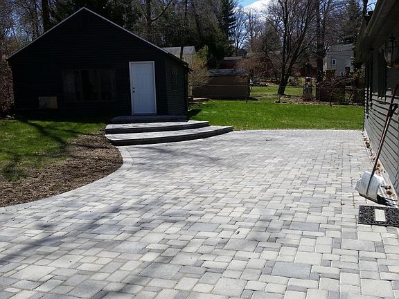 New stone patio out to cottage
