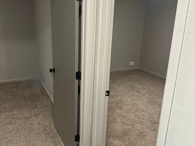 Left - Bedroom 2 and Laundry Room
Right - Master Bedroom with His and Hers walk in closet.