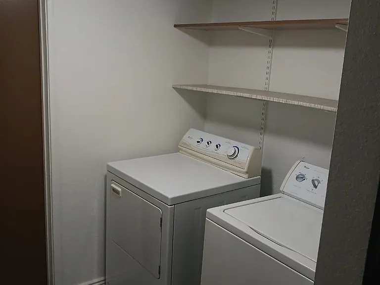 Laundry area, storage space.