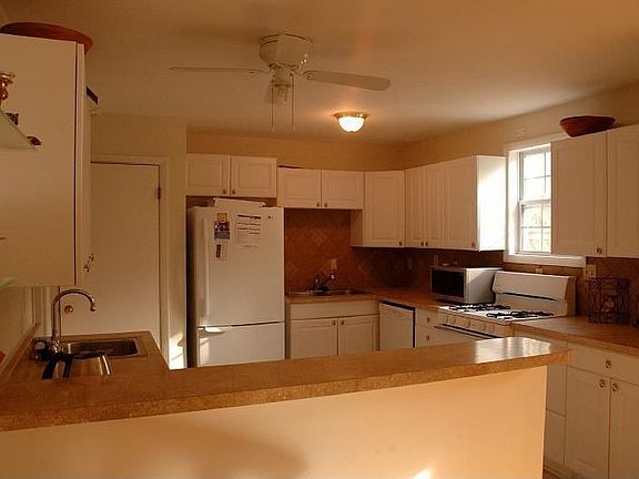 Remodeled kitchen with 3 sinks