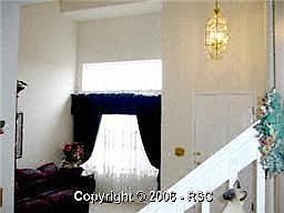 Living room with vaulted ceilings