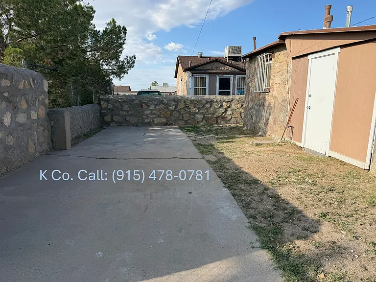 Backyard / Driveway - View 2