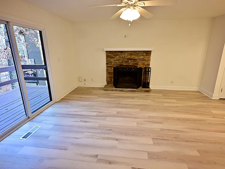 WOOD FIREPLACE IN LIVING ROOM