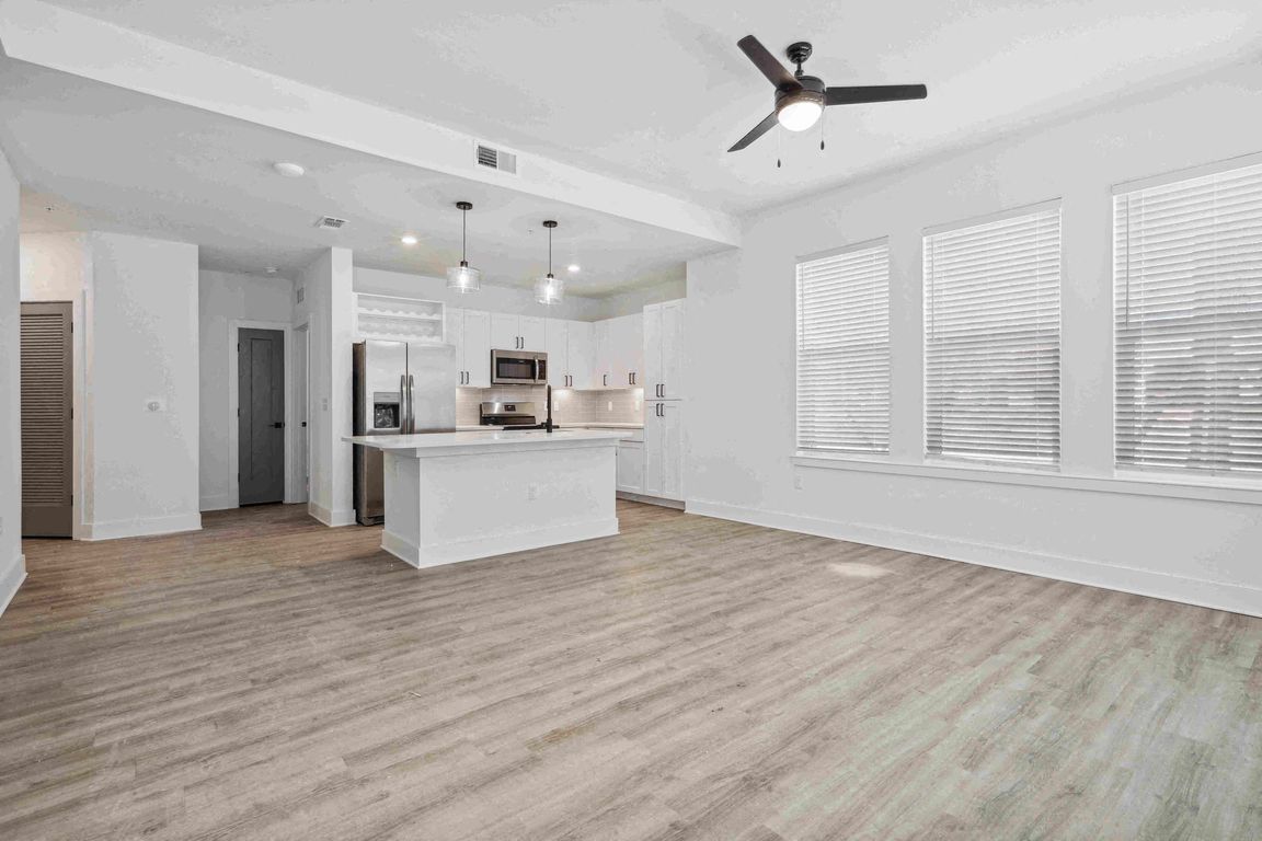 Living Room, Kitchen, & Dining Area