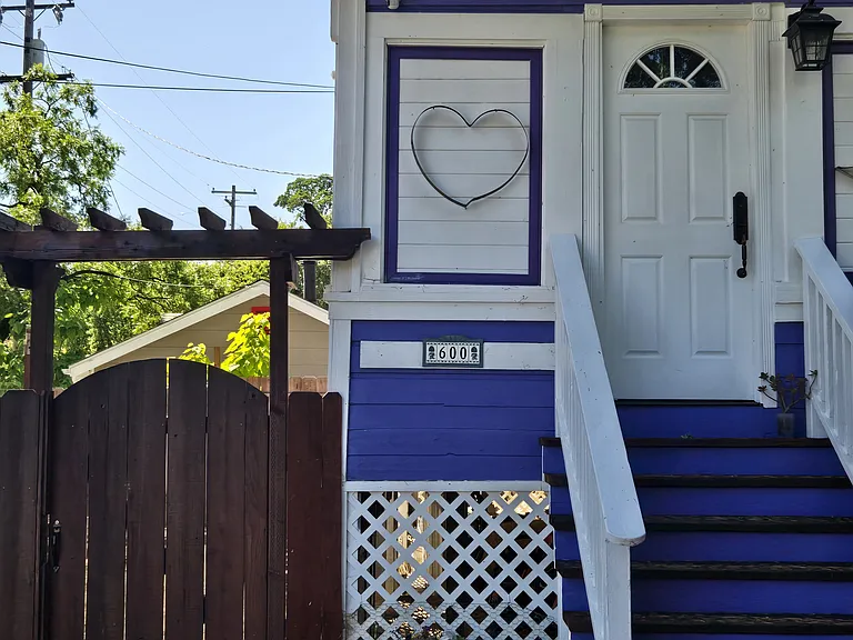 front door & the gate to the extra enclosed side area