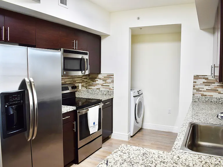 Kitchen with Stainless Steel Appliances and Granite Countertops