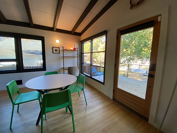 Sip your morning coffee to this view! Or.. maybe a shady porch session to wind down your day? Always a kind neighbor to wave to on this pedestrian friendly street.