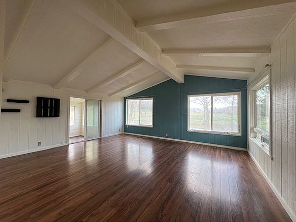 Living Room, sliding glass doors go to sunroom.