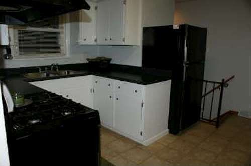 Kitchen with stairs to lower level