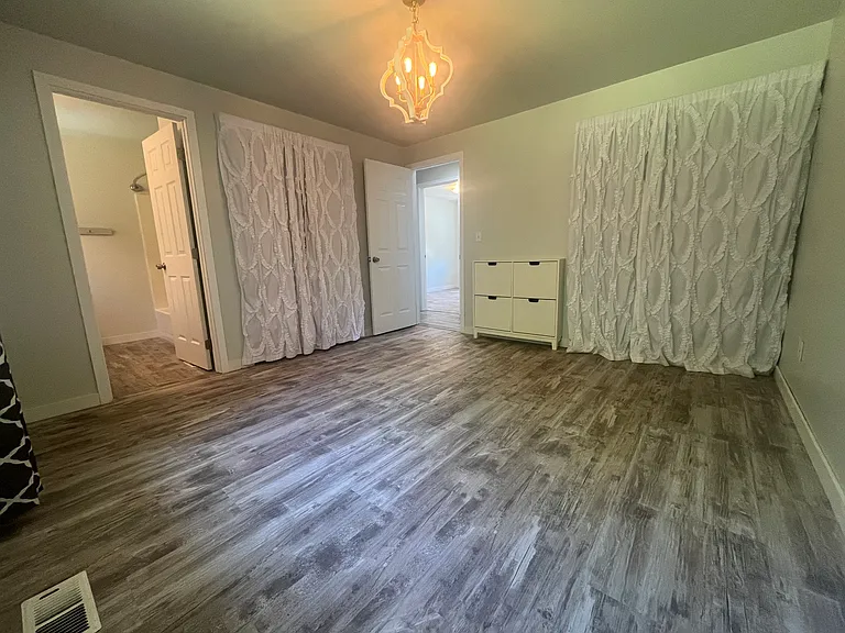 main bedroom suite with full bath