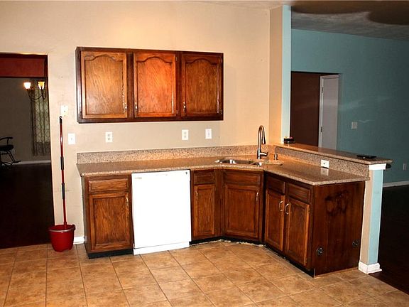 Kitchen opening up to Family Room