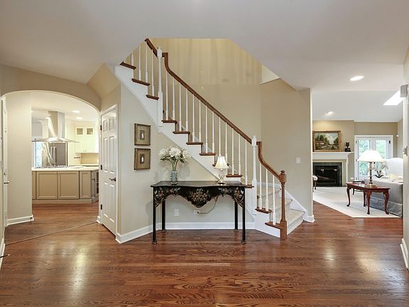 Spacious two story foyer, hardwood floors, easy access to living room and kitchen