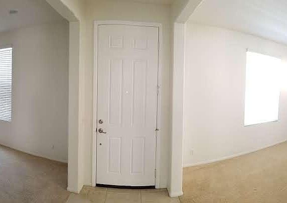 Family room (left) and formal dining are (right) by the main door