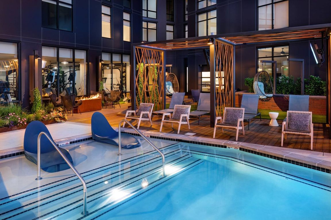 Sparkling Pool with Water Loungers and Cabanas