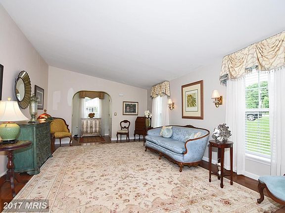 Spacious Living Room with beautiful hardwood floor