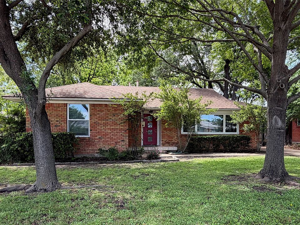 Brick exterior with a gabled shingle roof