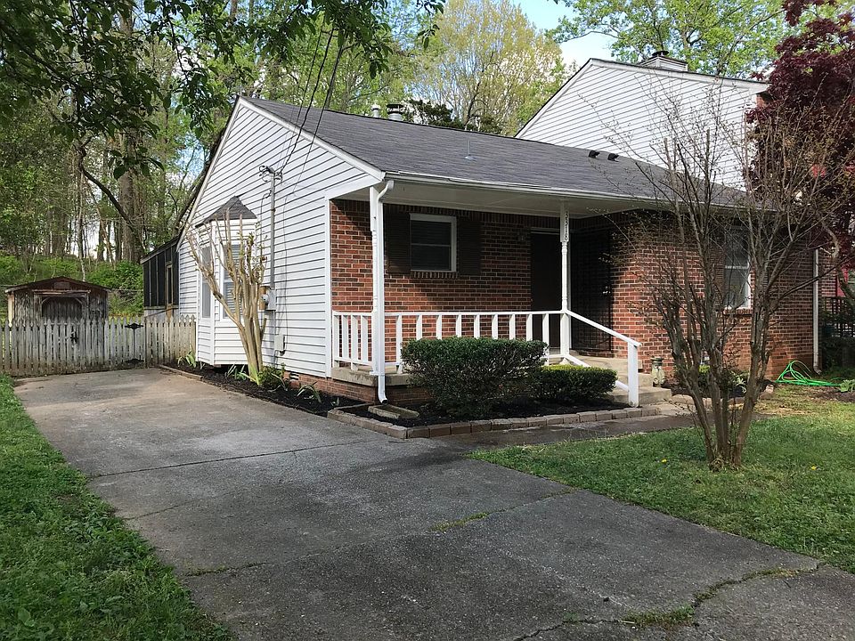 Parking for 4 cars and fenced in backyard with storage