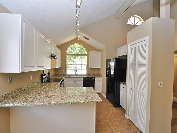 New 36 inch raised panel white cabinets