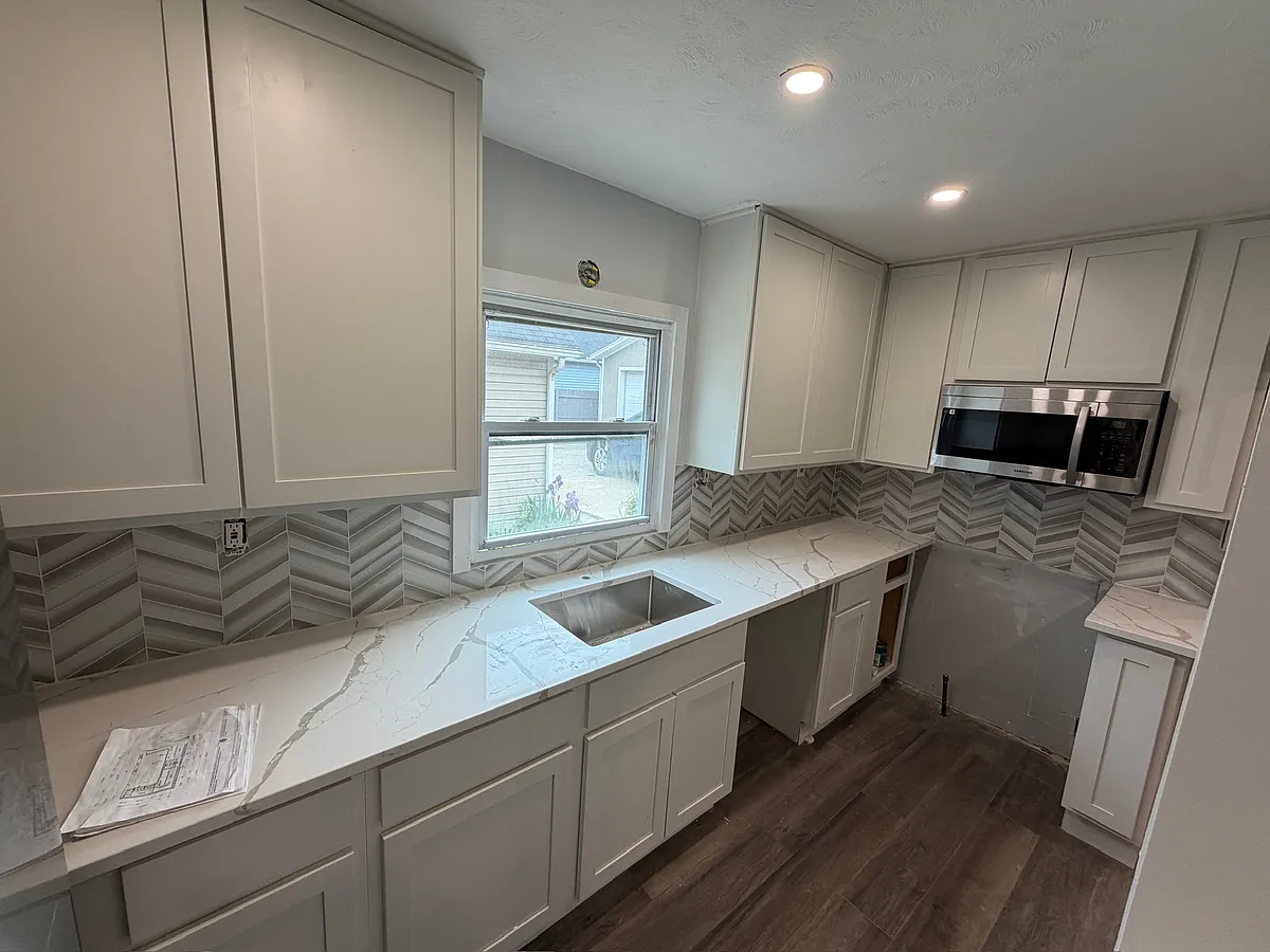 In final stages of renovation - faucets, dishwasher & oven to be installed - 2088 Fulton Rd #UP