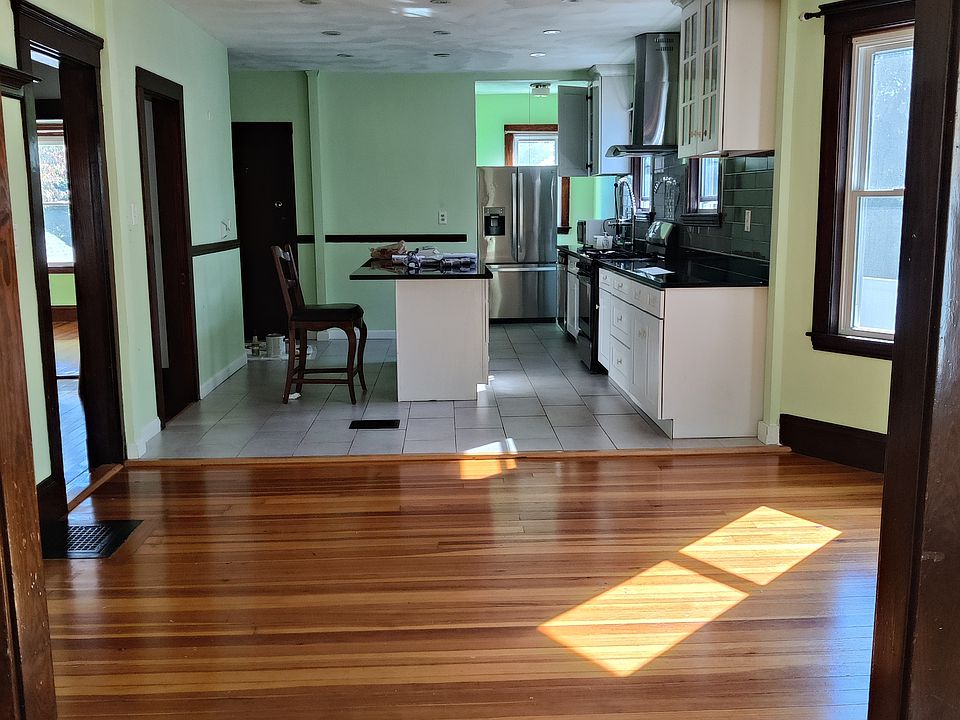Kitchen with a beautiful island opens into the dining area