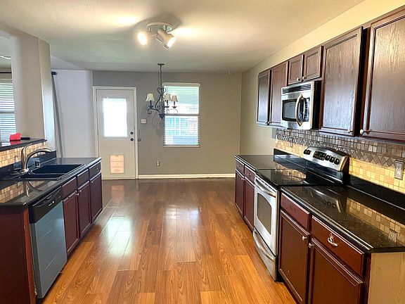 3rd image of 16100 Windsong Ct
