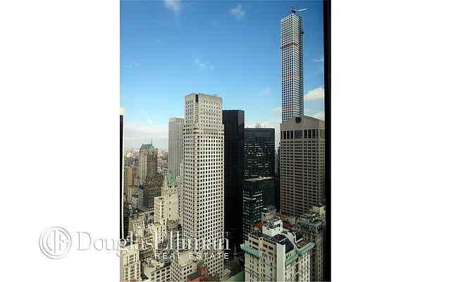 Sold by Douglas Elliman | media 13