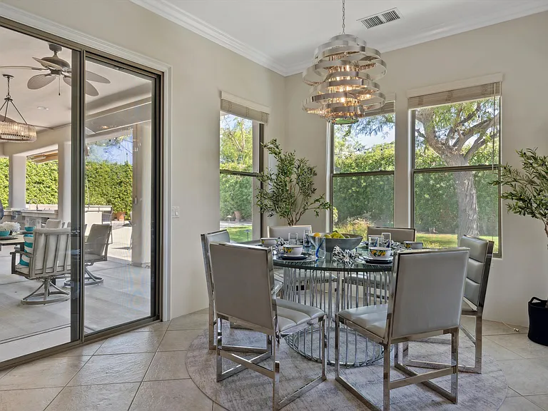 Breakfast table by the citrus garden