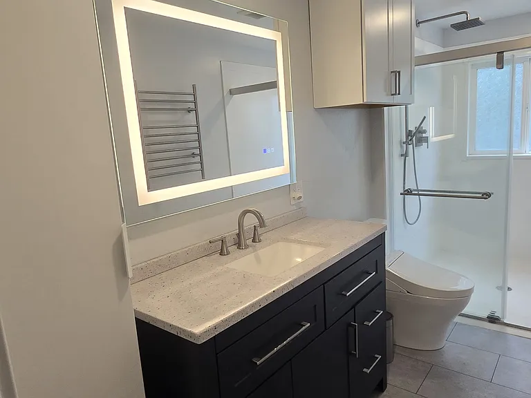 Master Bath. Large 60in x 56in custom shower. Heated floor and towel rack. Toto bidet and toilet.