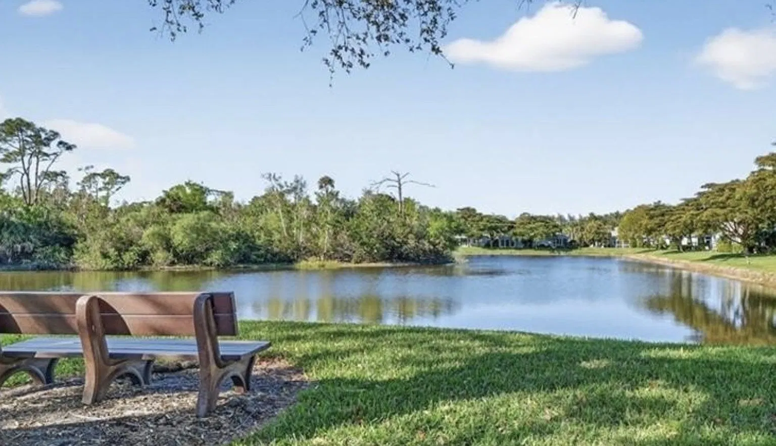 Beautifully Renovated Coach Home in Barbados at Tarpon Cove Lake & Preserve Views! Gated Communit... — Photo 1