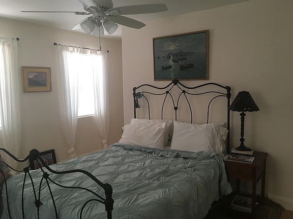 Upstairs master bedroom has a comfy latex queen mattress. This room has great views facing East and South.