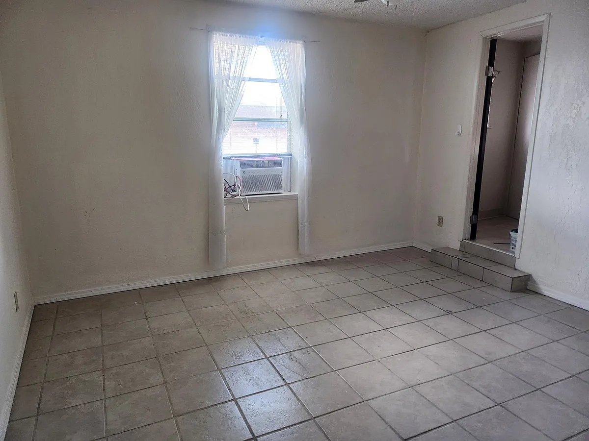 Building Photo - 9888 Taj Mahal St #12