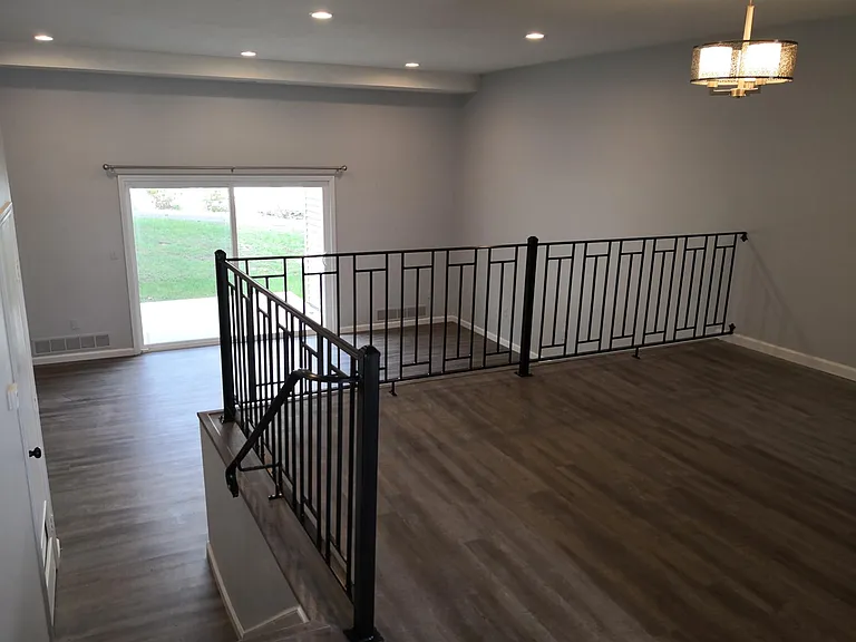 Dinning room with custom wrought iron railings