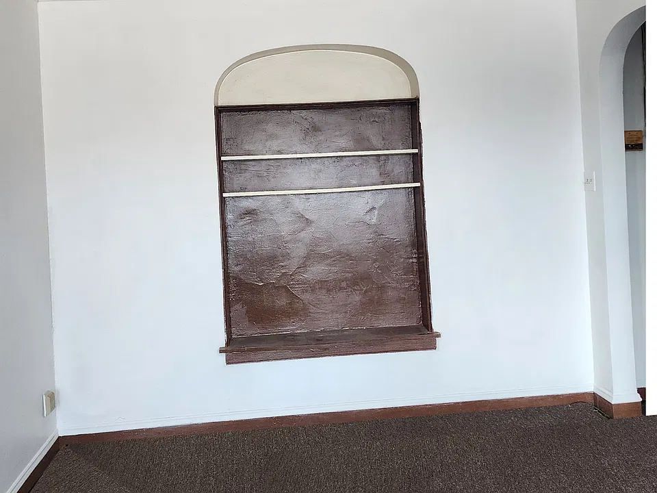 Built in. Great for books or art.