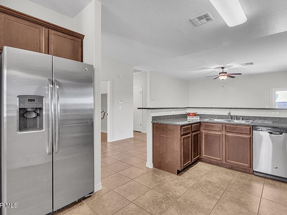 4th image of 14304 S Cave Ave