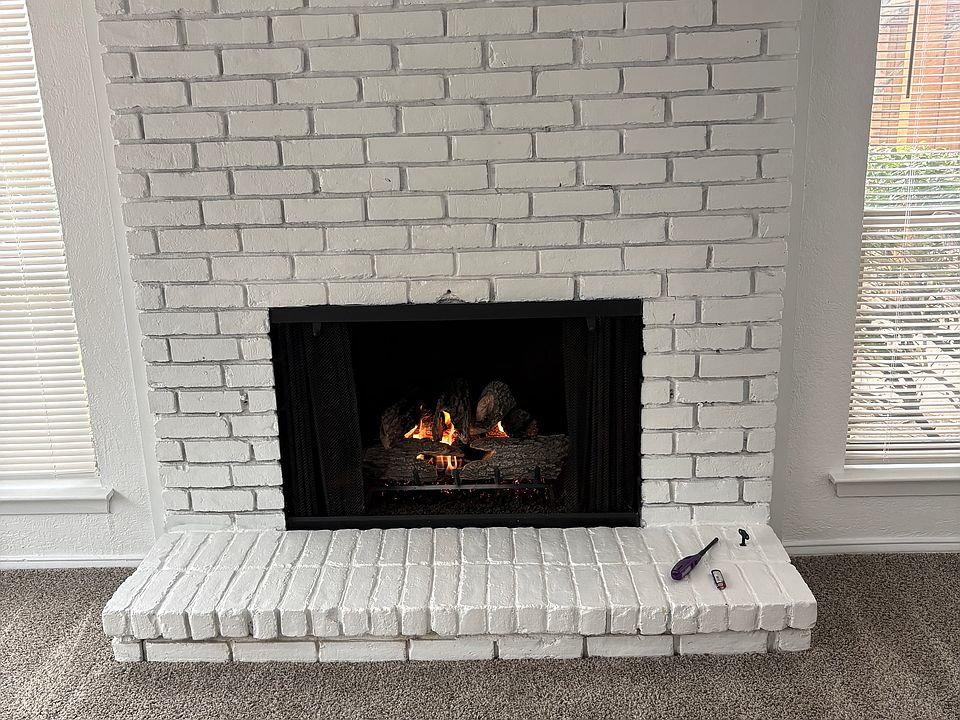 Living Room gas log fireplace.