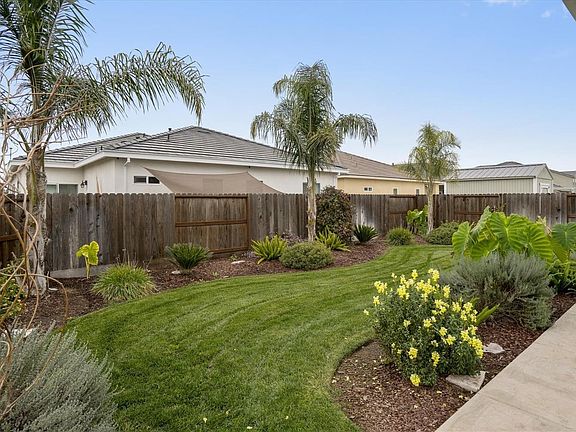 Beautifully landscaped backyard.